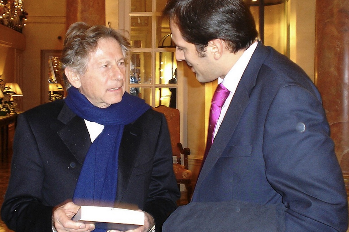 Regisseur Roman Polanski (links) 2005 in Madrid im Gespräch mit dem spanischen Schriftsteller und Filmhistoriker Diego Moldes.